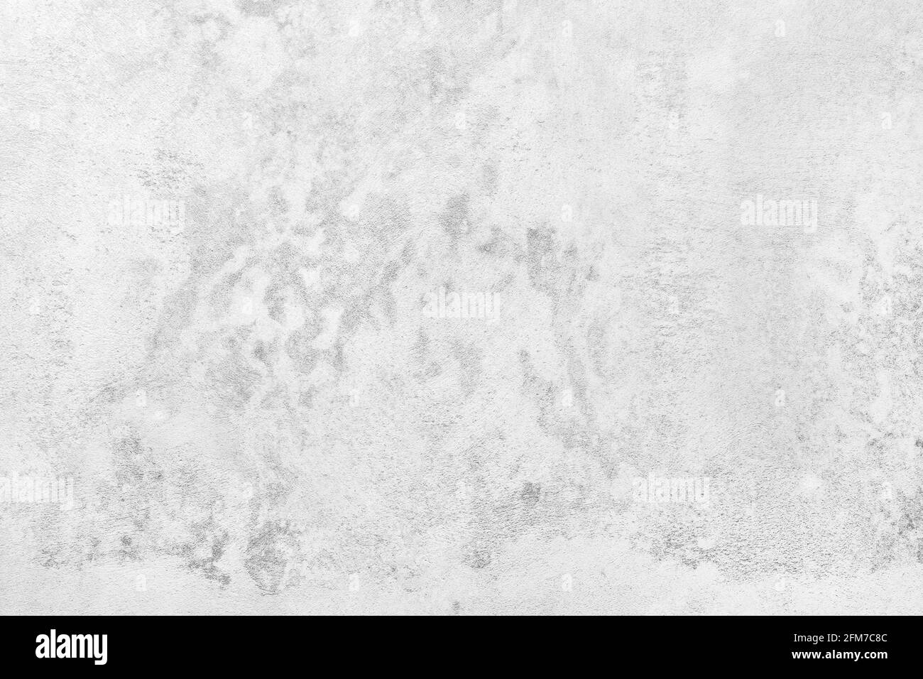 The wall is a light gray white concrete building cement texture background. Stock Photo