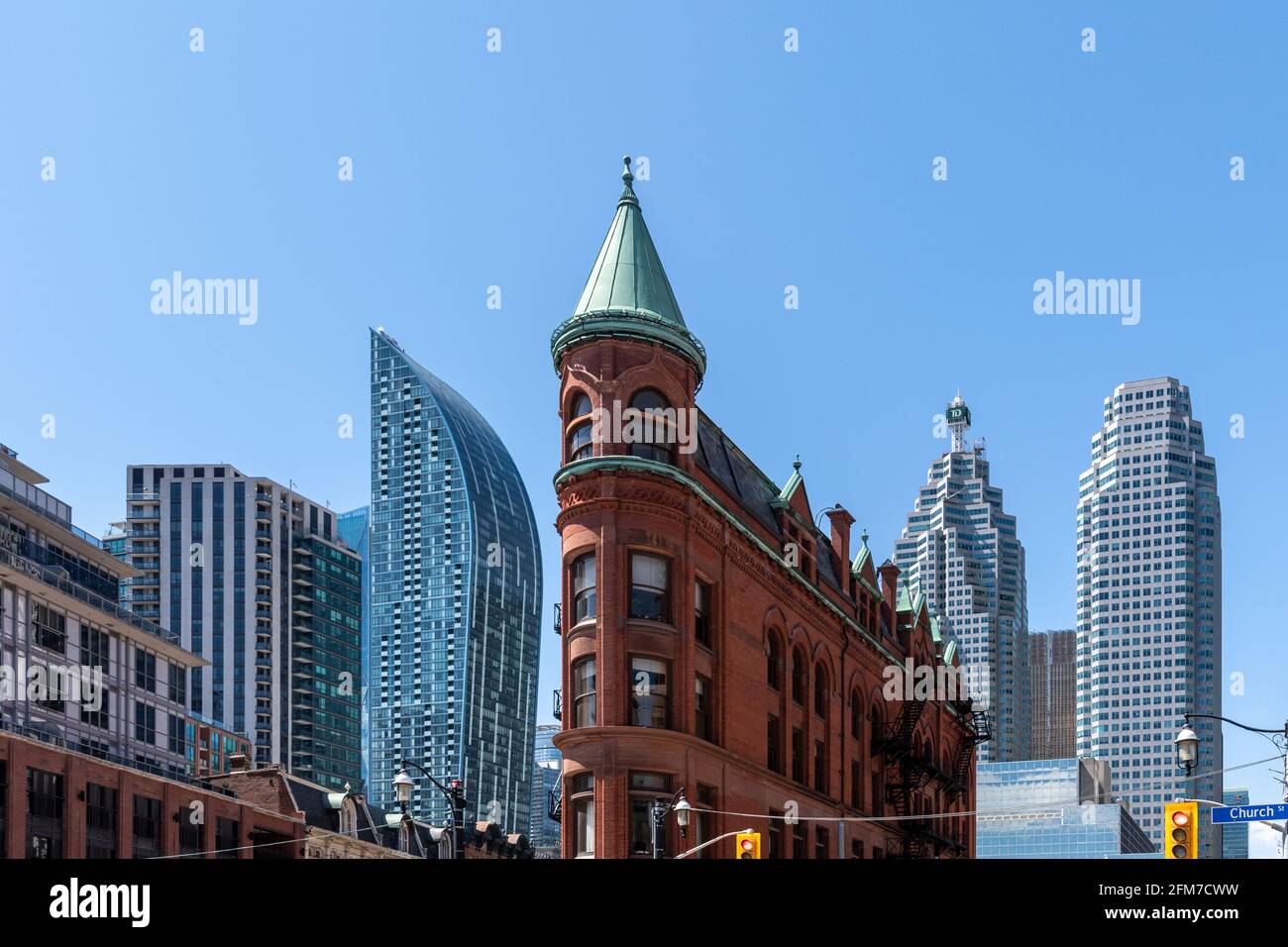 The L Tower curved architecture in the Toronto downtown, Canada. The Flatiron Building appears at this angle Stock Photo