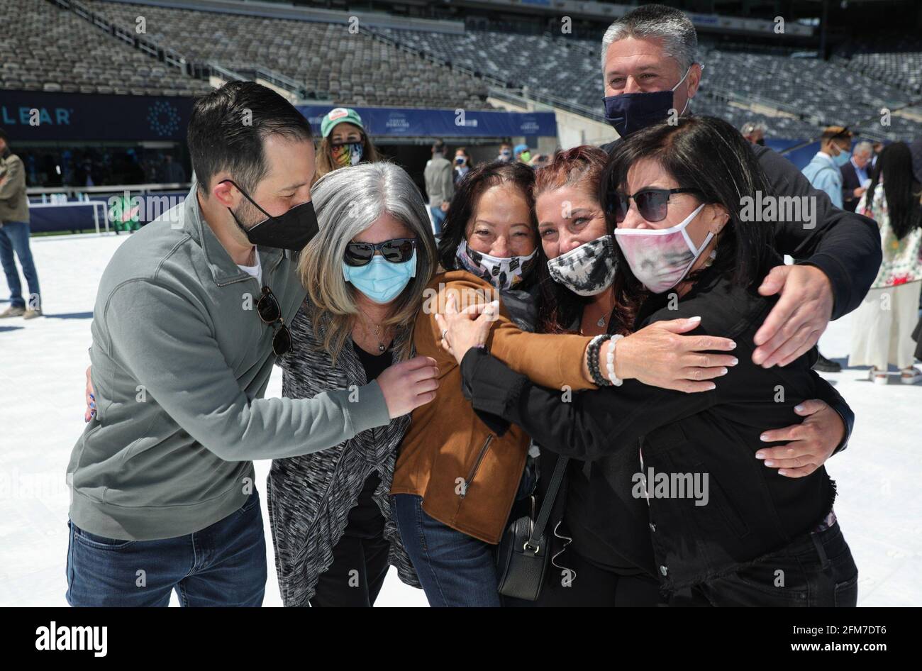 East Rutherford, NJ, USA. 6th May, 2021. Family reunion Photo Call for CLEAR Brings Together Over 100 Family Members Separated During COVID to Reunite for the First Time, MetLife Stadium, East Rutherford, NJ May 6, 2021. Credit: CJ Rivera/Everett Collection/Alamy Live News Stock Photo