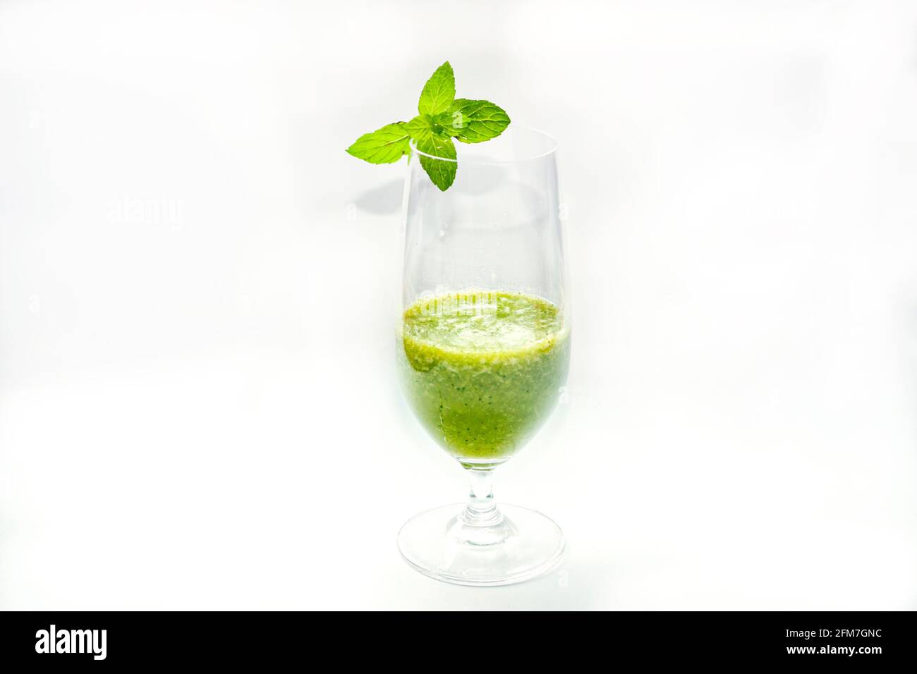 smoothie detox green juice herval vegan dink served in glass adorned with mint leaves in Mexico City Stock Photo
