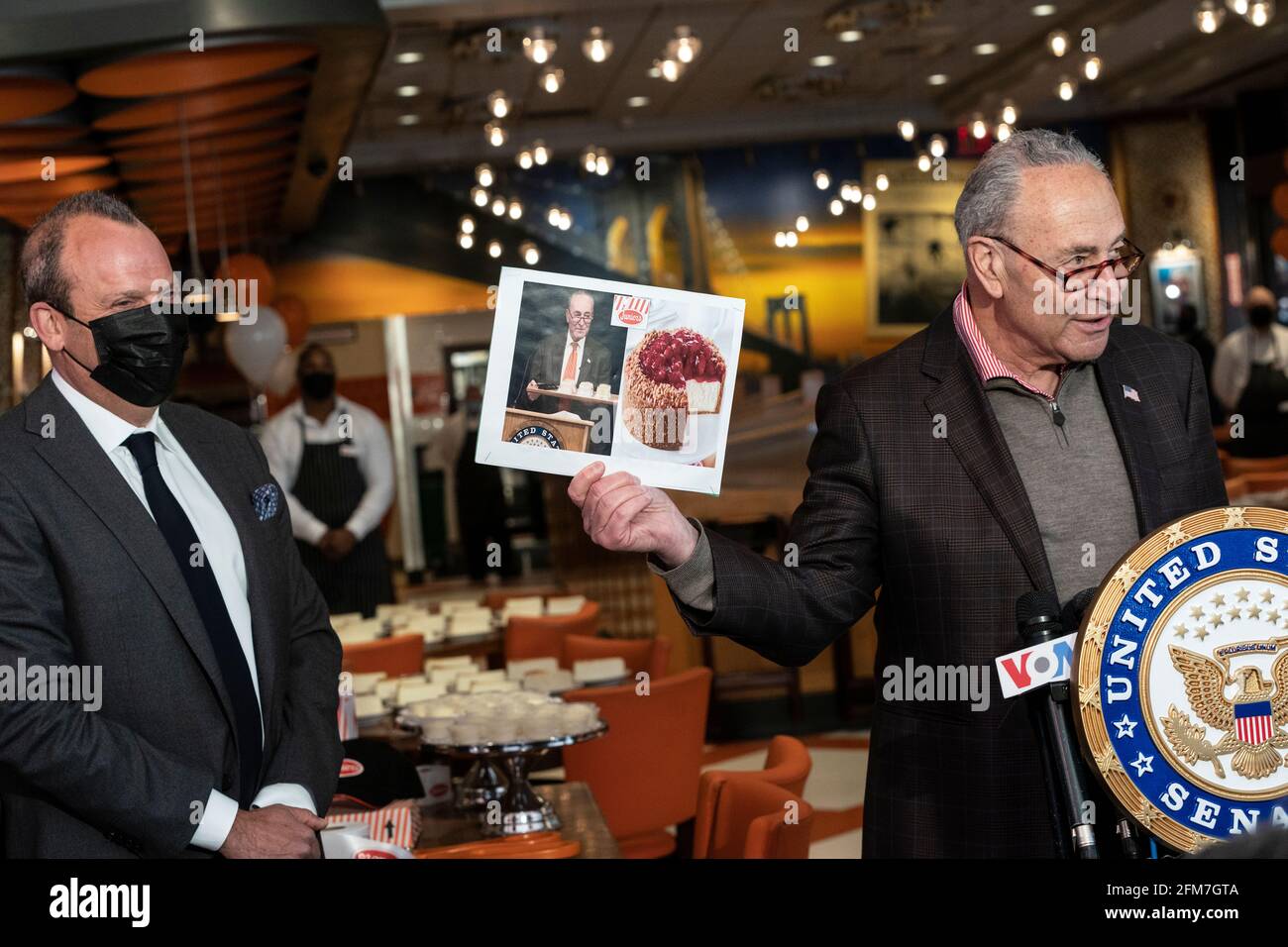 New York, NY - May 6, 2021: U. S. Senator Charles Schumer marks re-opening of Junior’s Cheesecake restaurant on Times Square Stock Photo