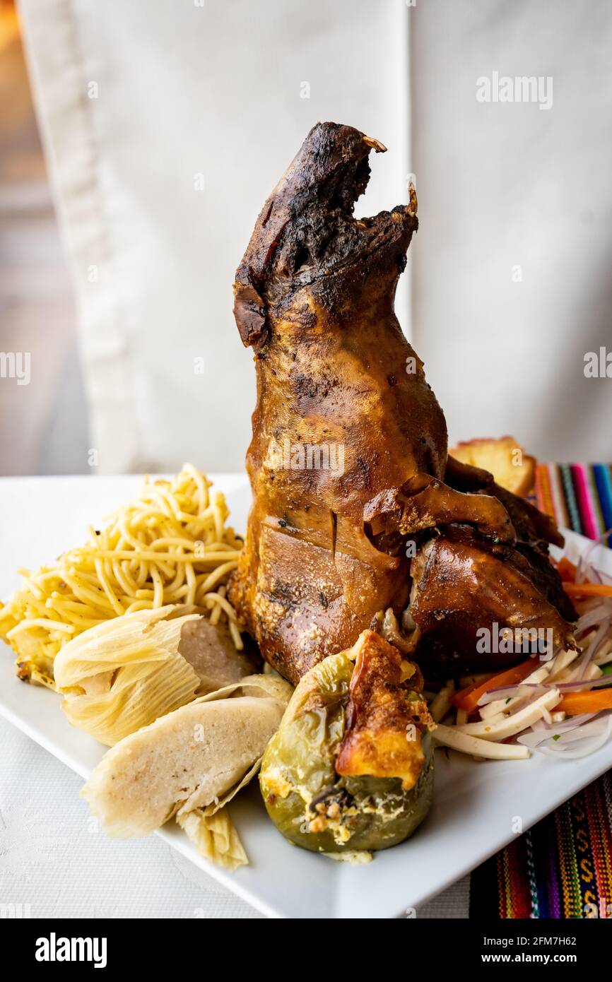 Cuy (Guinea Pig) is a regional specialty in Cusco located in the Peruvian Andes Stock Photo