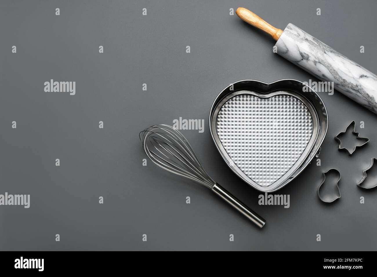 Set of kitchen utensils on dark background Stock Photo