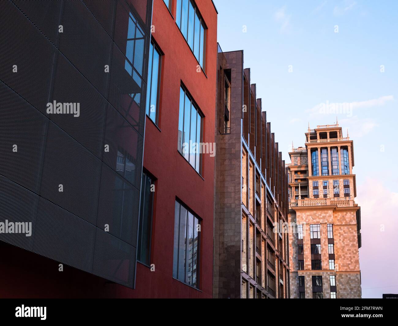 view of buildings of former bolshevik factory in Moscow city in sunny ...