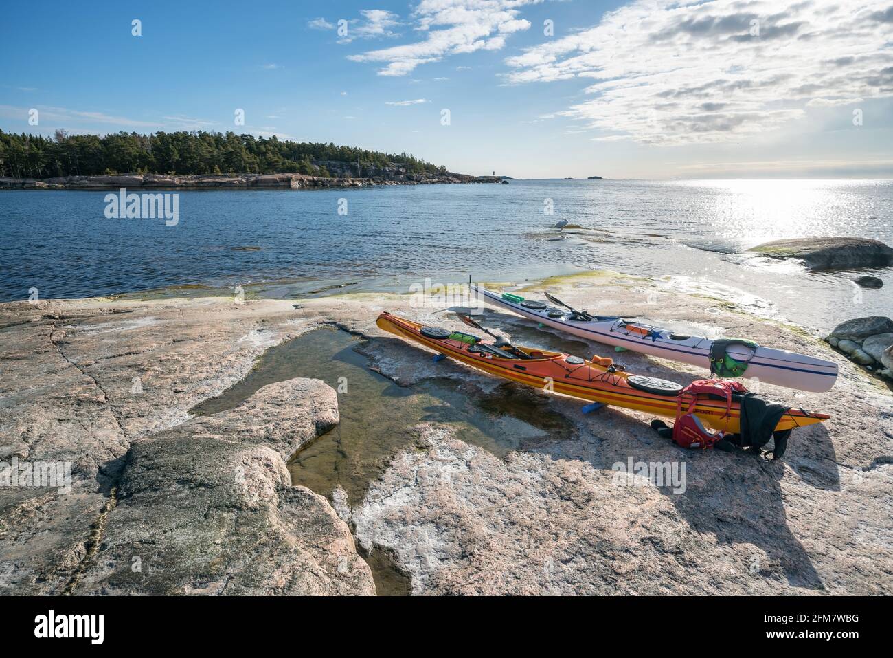 Kayaks at the shore of Pirttisaari island, Porvoo, Finland Stock Photo