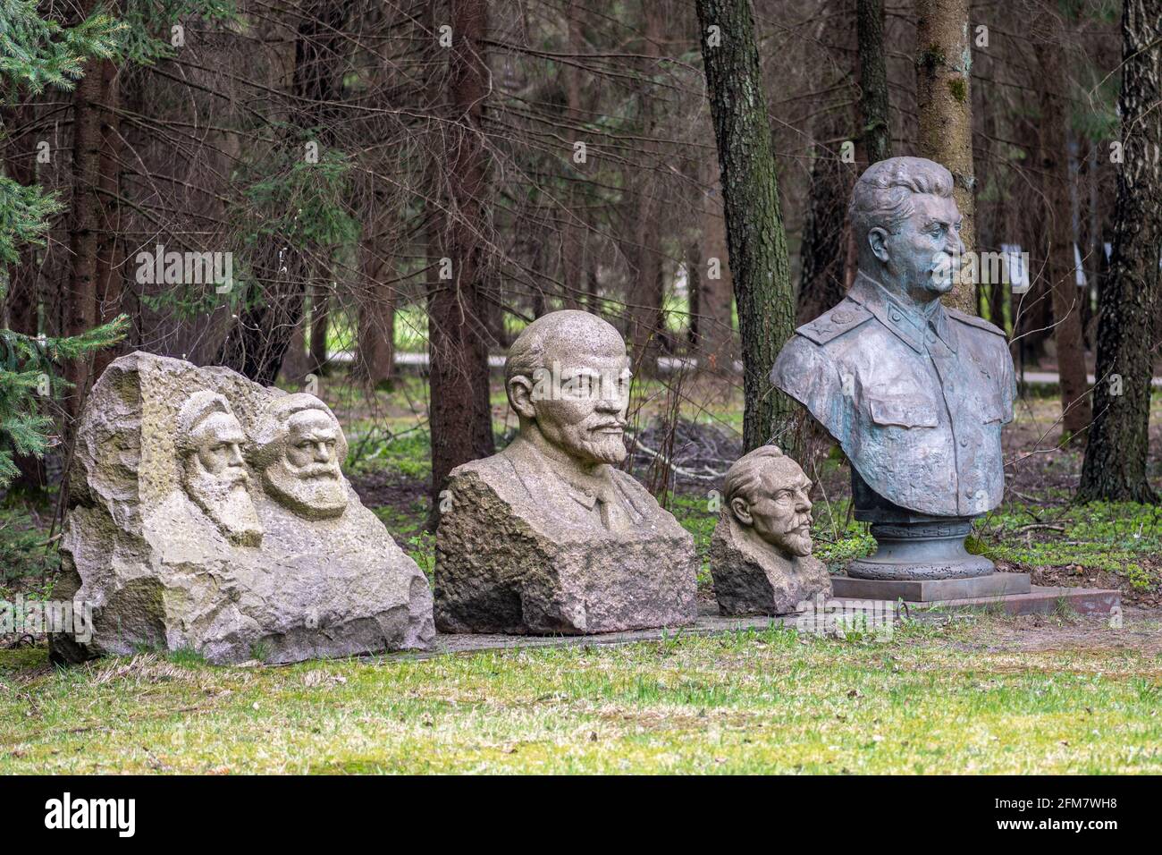 Stalin bronze sculpture bust, Lenin, Marx and Engels marble sculpture bust, Soviet Union, Communism symbols together in a park Stock Photo