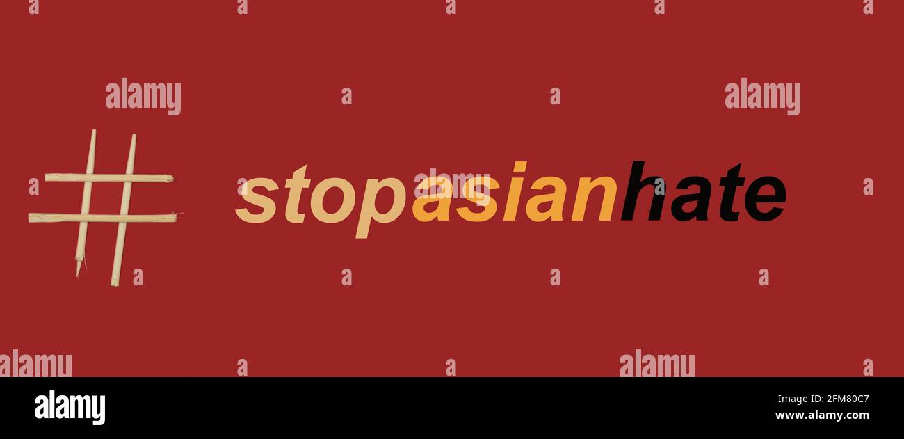 Stop Asian hate concept. Banner with chopsticks and words stop Asian hate Stock Photo