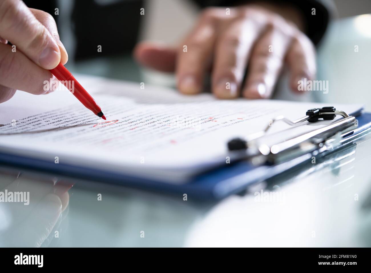 Editing Essay Content On Paper. Proofreader Marking Mistake Stock Photo