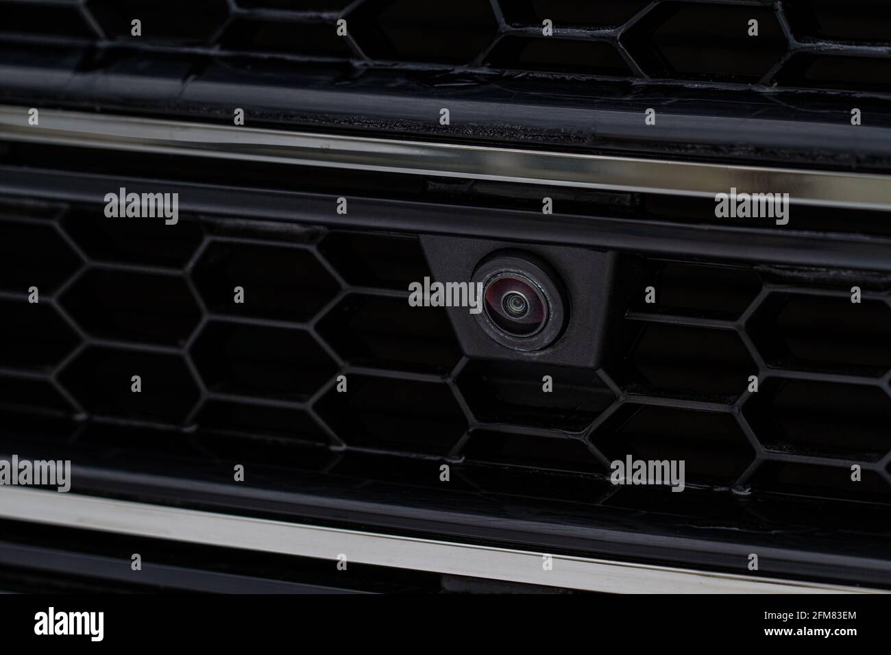 Close up view of front parking assist video camera on the car. Front view  camera of modern car Stock Photo - Alamy