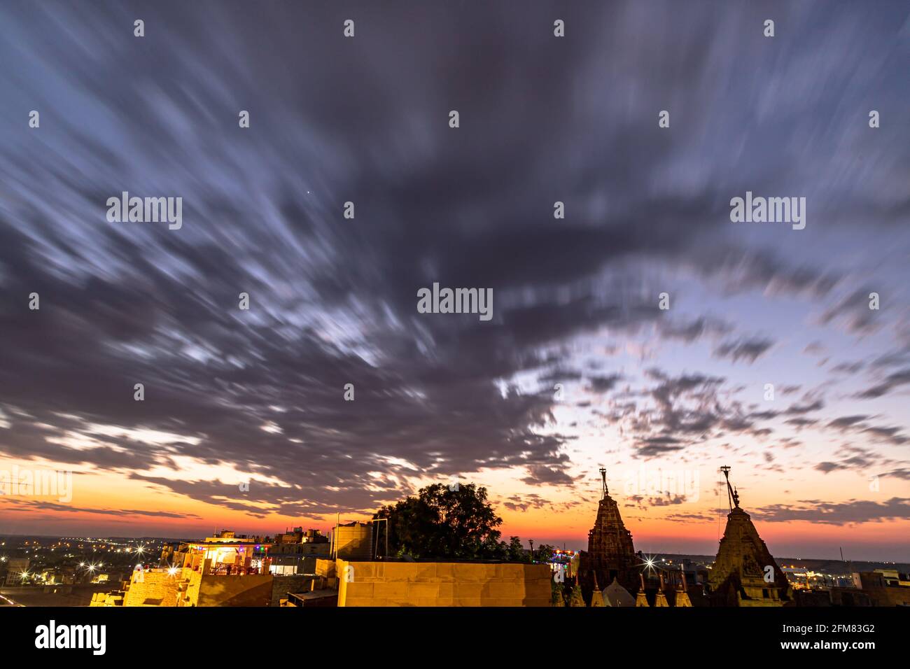 dramatic sky and beautiful sunset near jain temple jaisalmer,rajasthan. Stock Photo