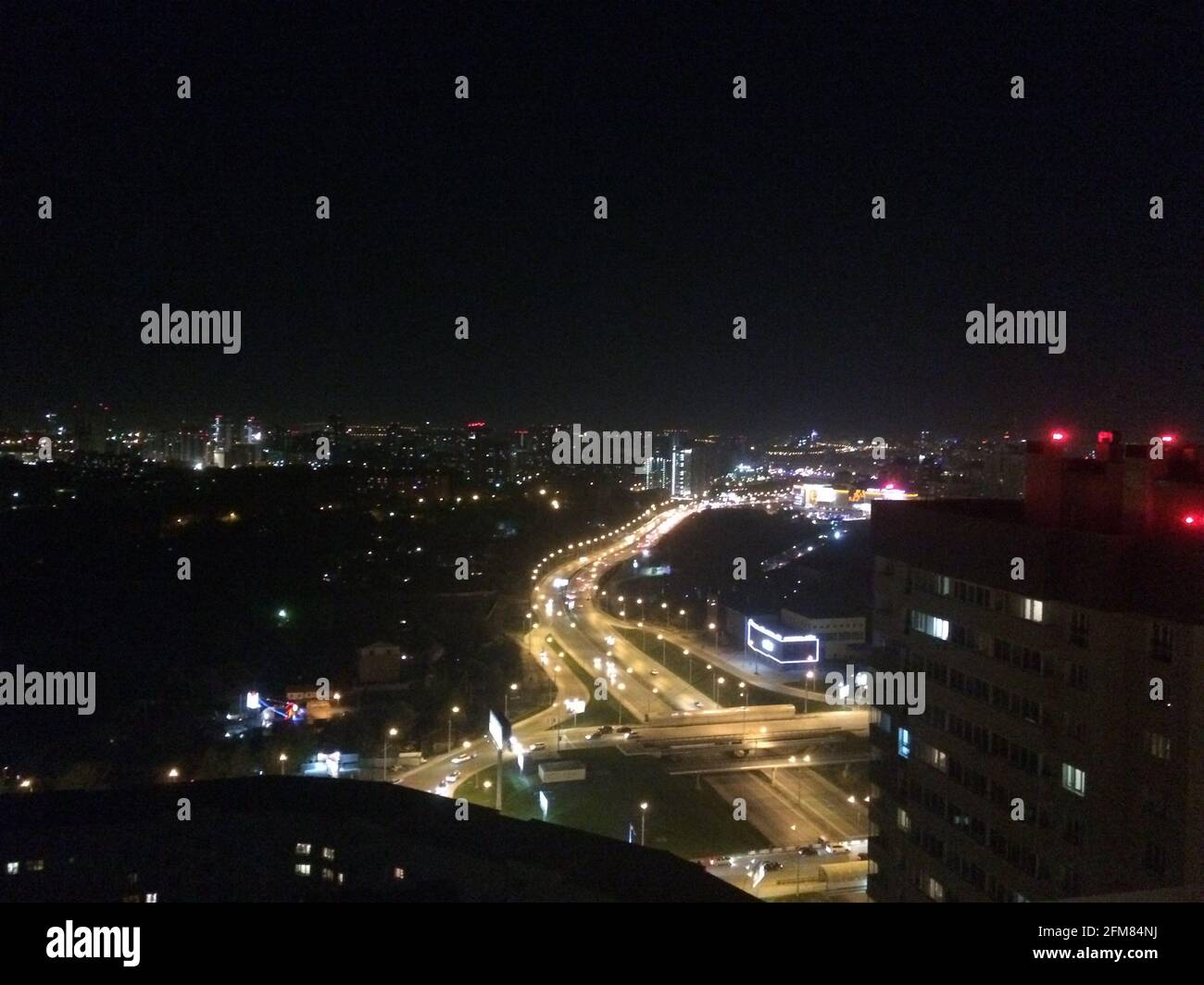 Aerial view of night city lights with road traffic Stock Photo - Alamy