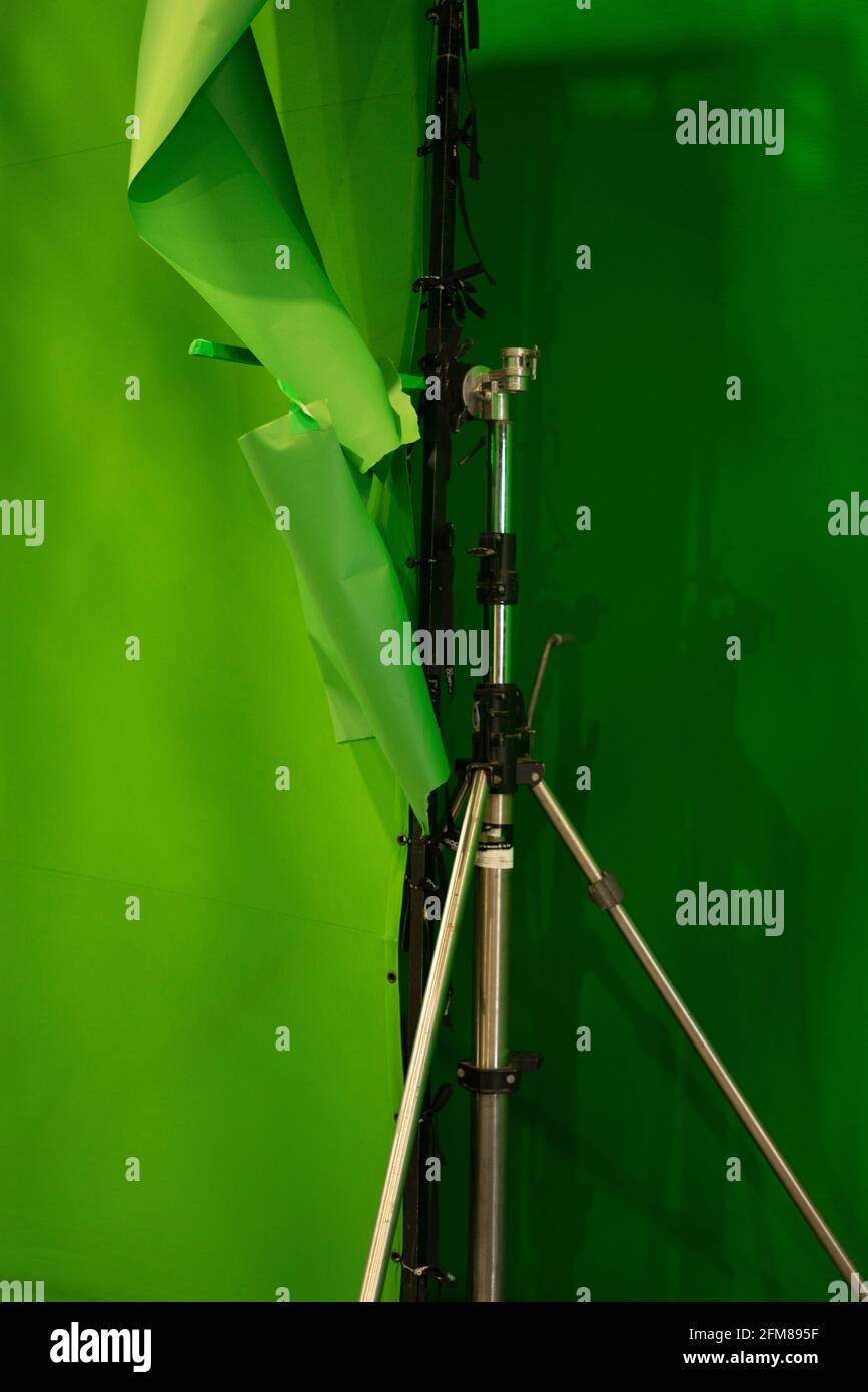 Green croma key screen in television, movie film and photography studio for  shoots and photography Stock Photo - Alamy