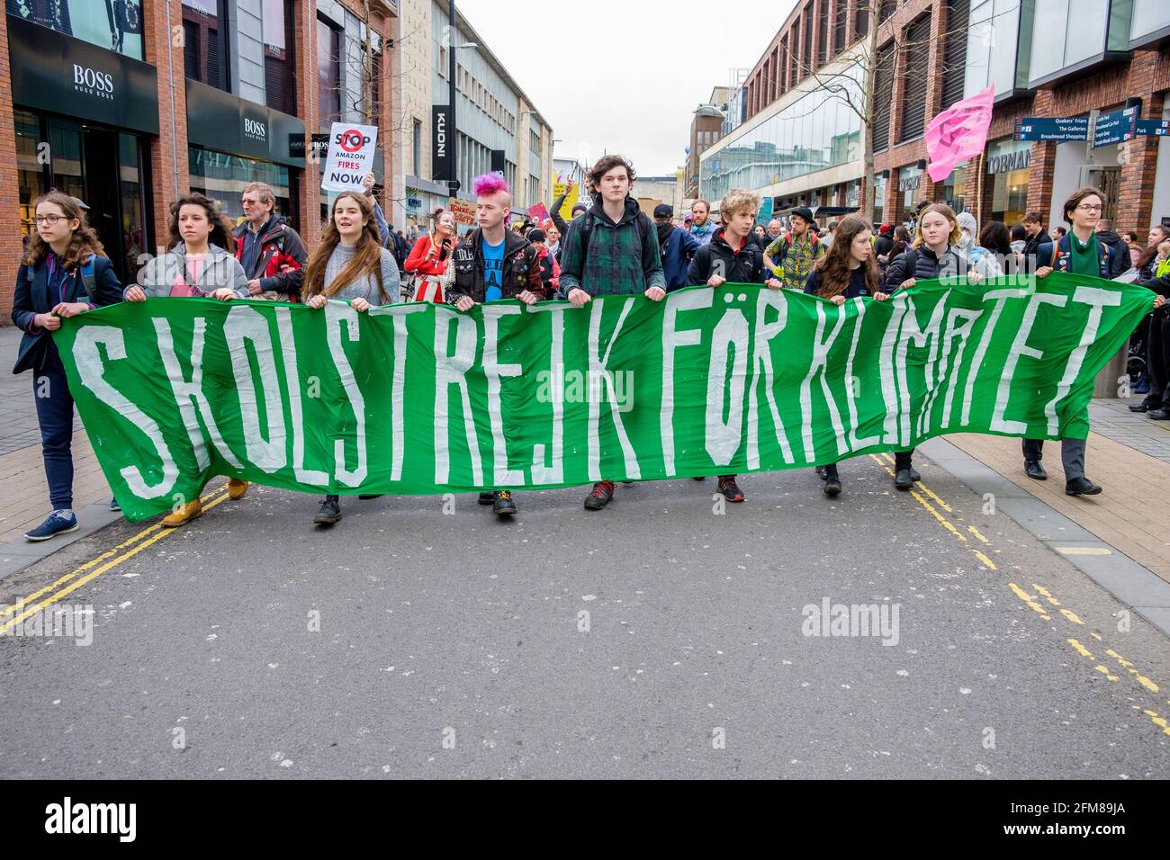 Bristol college student protesters and school children are pictured taking part in a Youth Strike 4 Climate change protest march in Bristol 14-02-20 Stock Photo