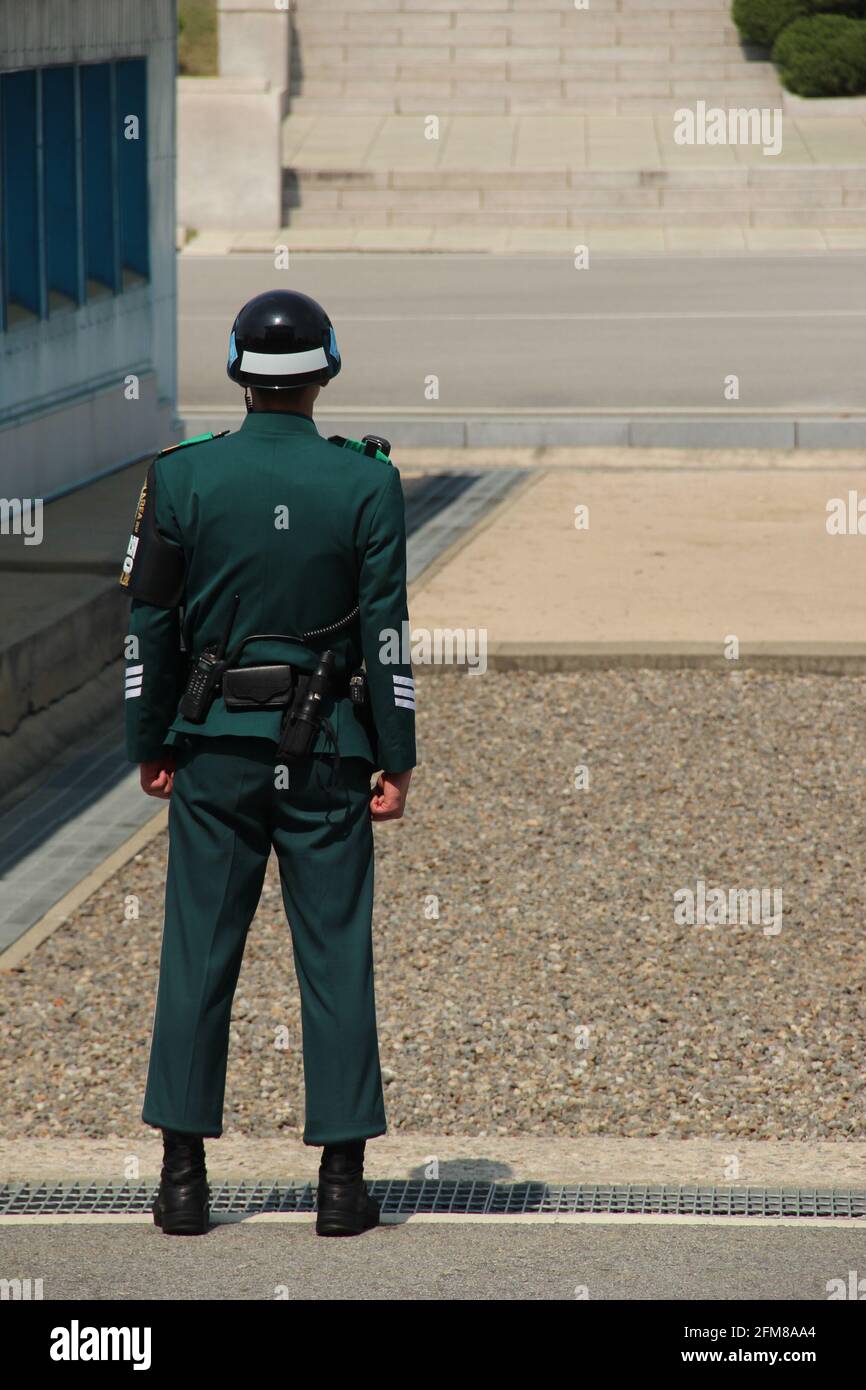 A Republic of Korea soldier stands guard at the border with North Korea in the Joint Security Area (Panmunjeom) Stock Photo