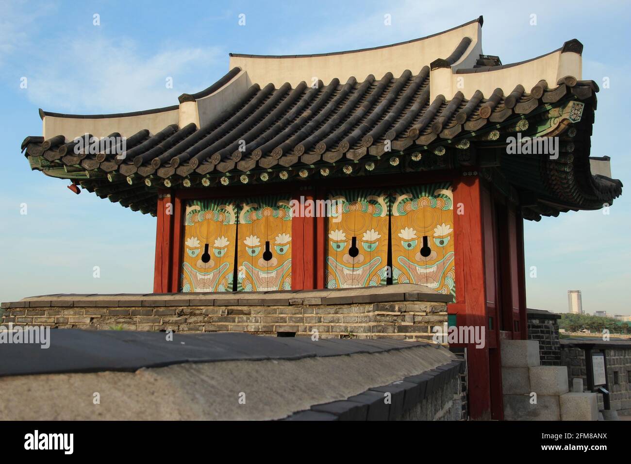 Windows made for archers in a watch tower on the Hwaseong in Suwon, South Korea Stock Photo