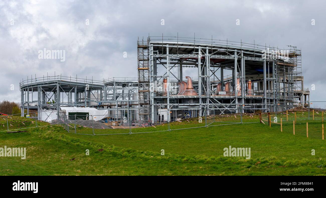 New copper distillation stills visible during construction of scotch whisky distillery for Gordon & MacPhail in Speyside at Craggan, Grantown-on-Spey Stock Photo
