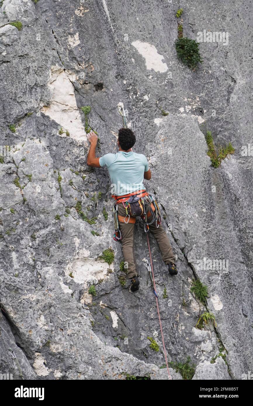Rock Climbing, A man climbing a natural wall at Llano del Hondonero, Villanueva del Rosario, Andalucia, Southern Spain. Stock Photo
