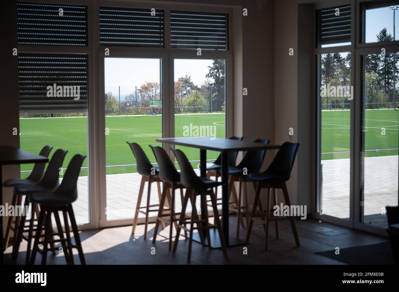 Kronberg Im Taunus, Germany. 25th Apr, 2021. Shutters are lowered at the SG Oberhöchstadt clubhouse. Credit: Sebastian Gollnow/dpa/Alamy Live News Stock Photo