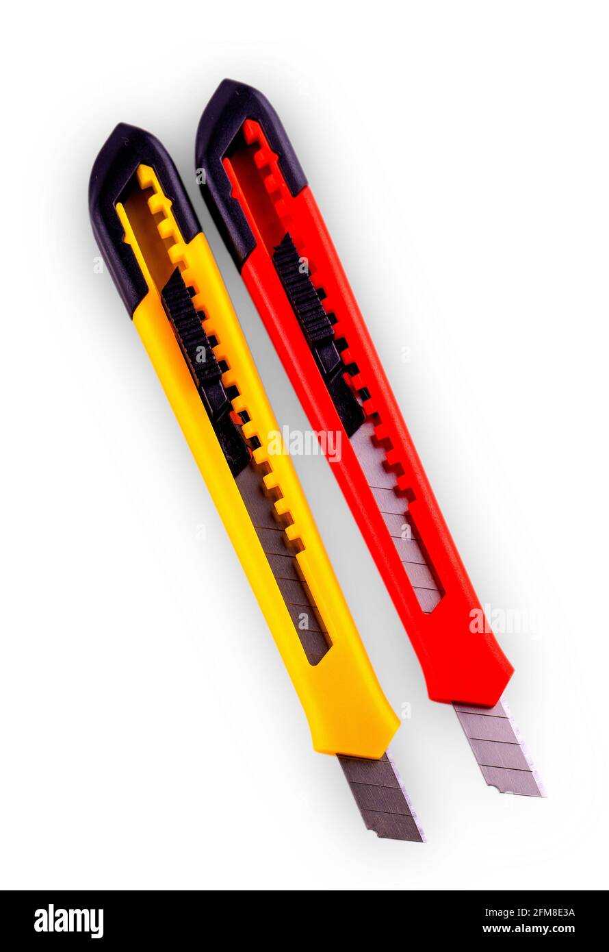 Yellow and red paper cutter with opened blade, isolated on white ...