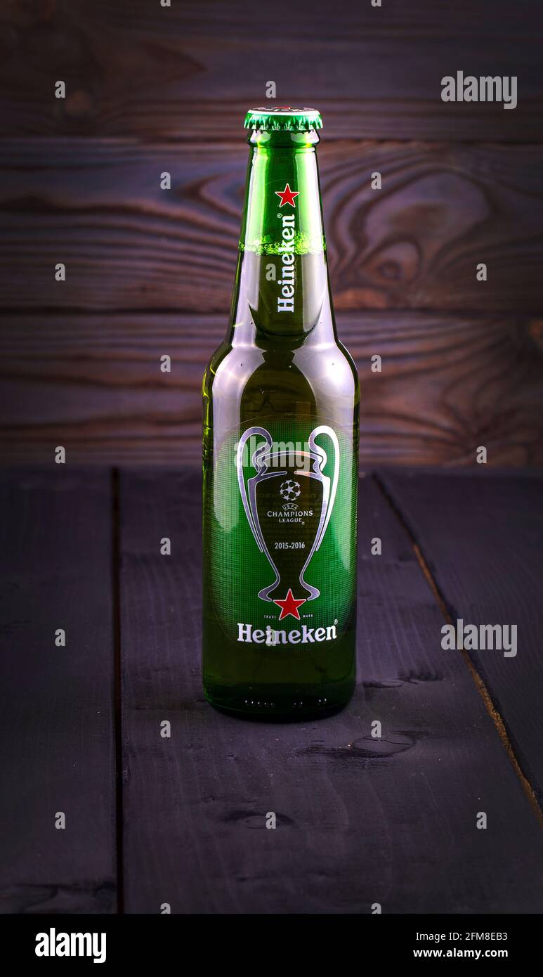 PETROPAVLOVSK-KAMCHATSKY, KAMCHATKA- OCTOBER -07, 2016 : Bottle of Heineken beer over wooden background. Special edition for UEFA European Championshi Stock Photo