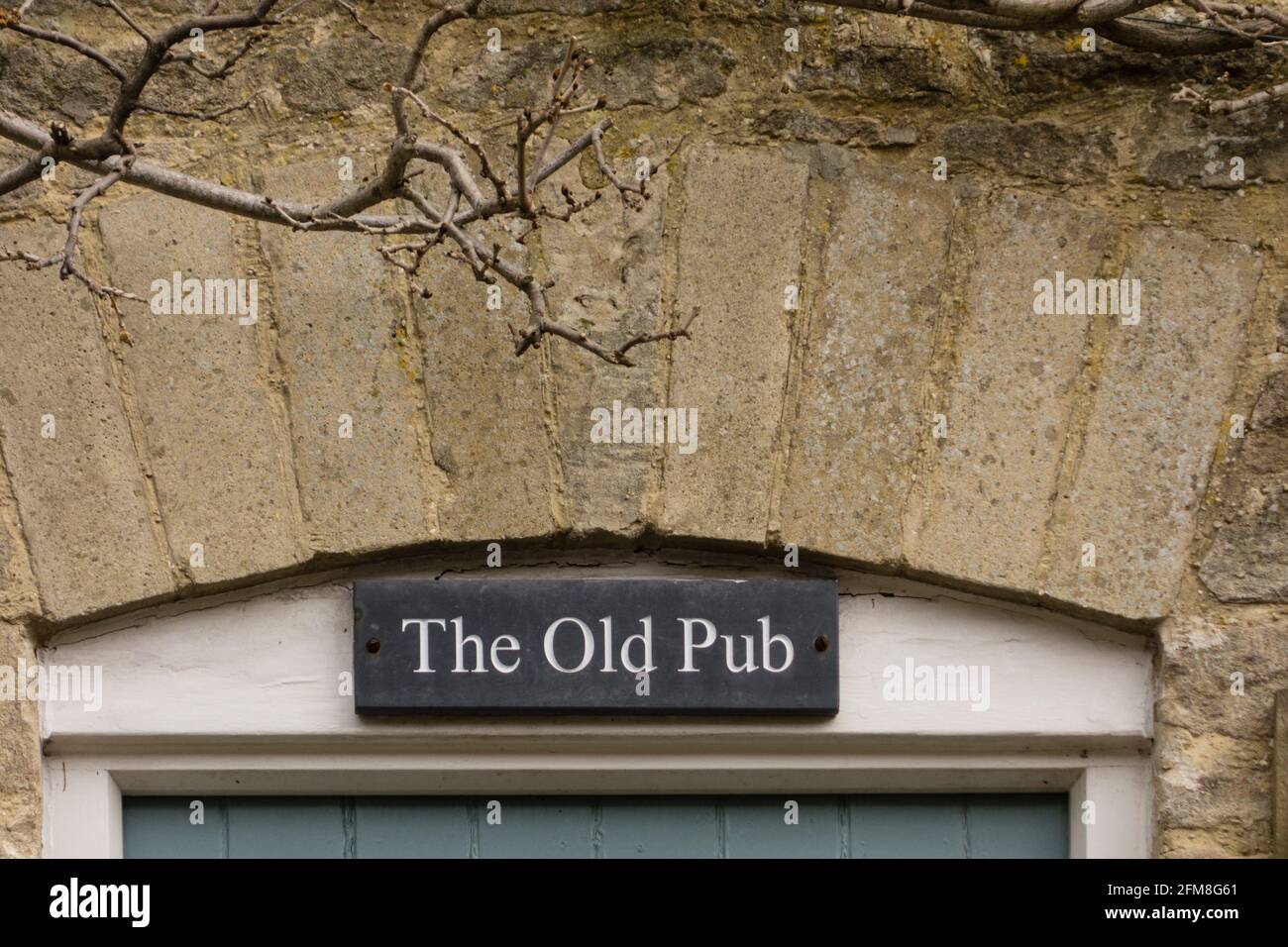The Old Pub plaque, Tetbury, Gloucestershire, UK Stock Photo