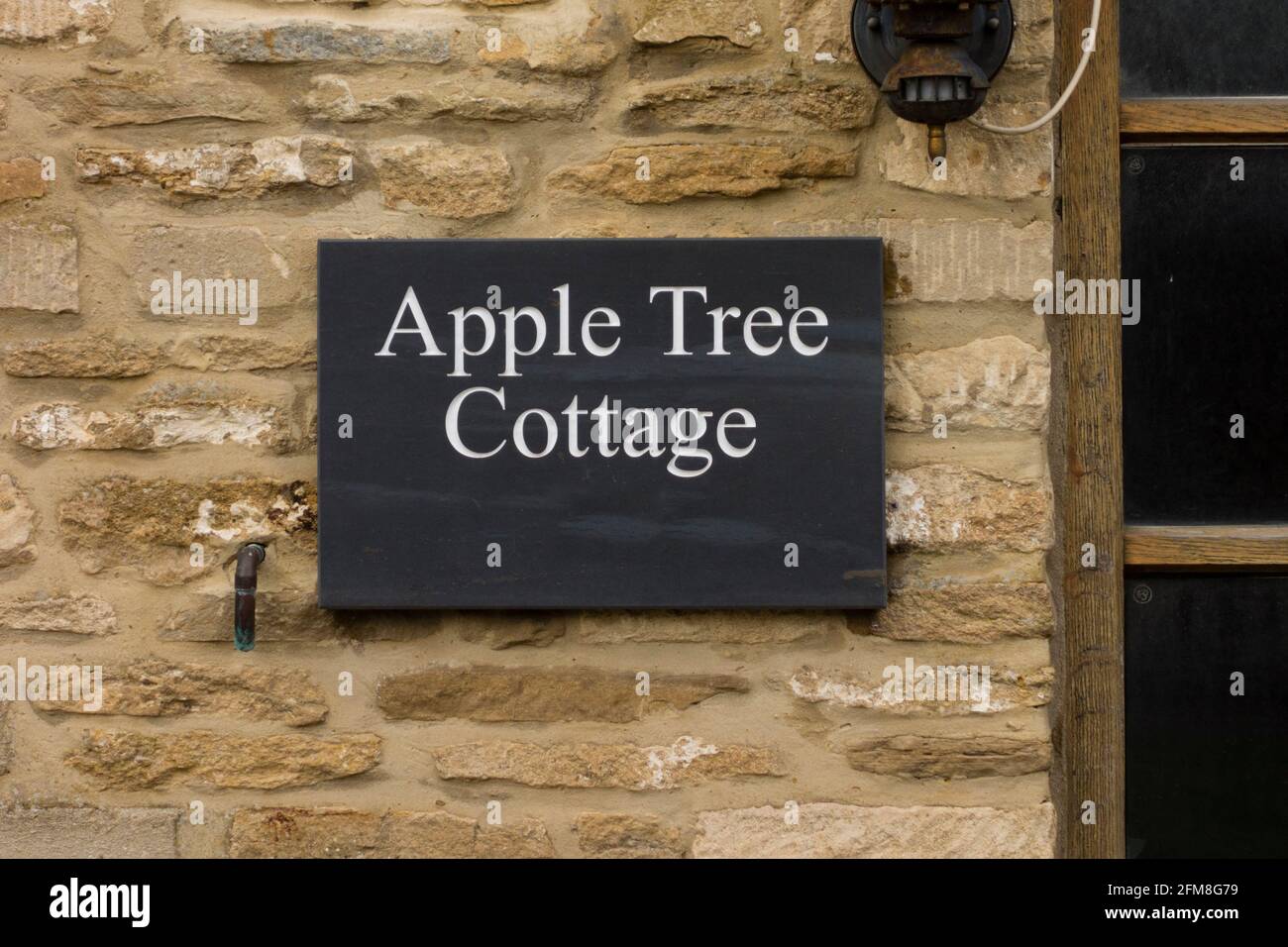 Apple Tree cottage plaque, Tetbury, Gloucestershire, UK Stock Photo