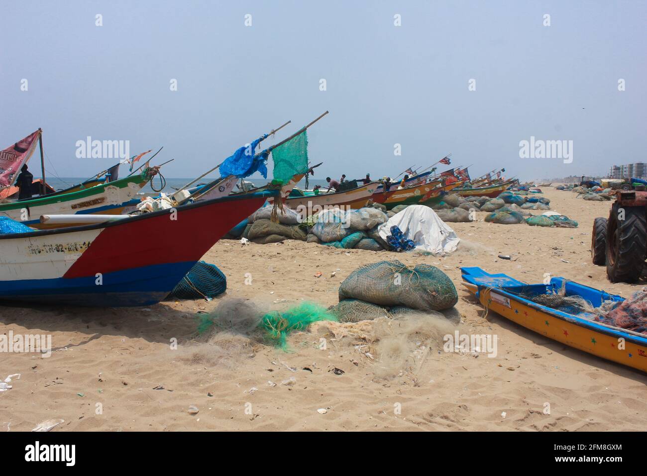 Fishing boats on Marina Beach Chennai Tamil Nadu India Stock Photo - Alamy