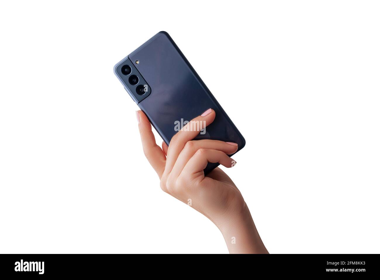 Woman hand shows a modern phone with three cameras on the back. Isolated background Stock Photo