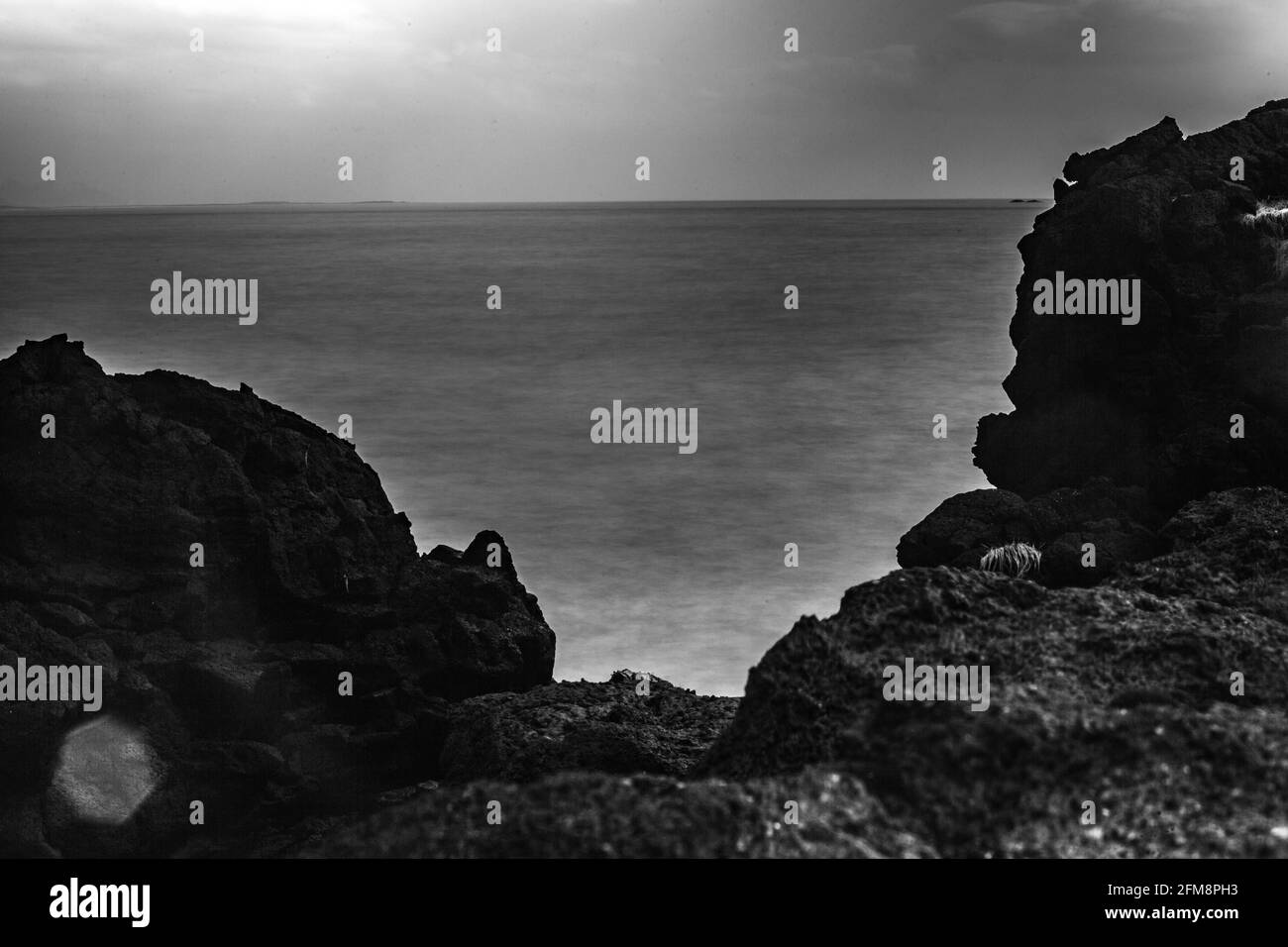 Rocky island Black and White Stock Photos & Images - Alamy