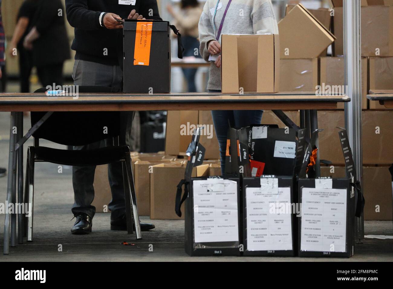 Ballot boxes are emptied during the counting for local elections at