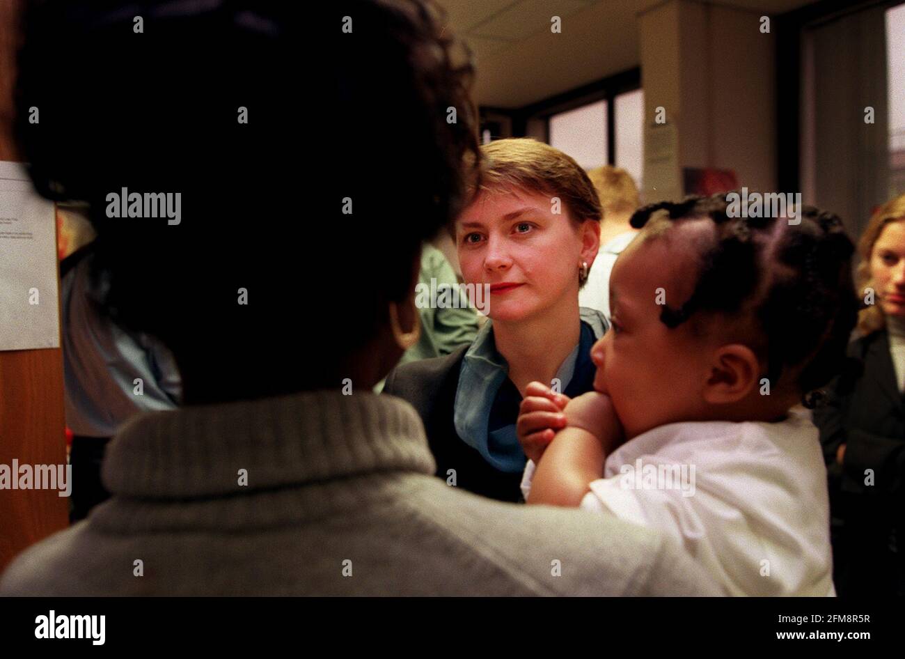 YVETTE COOPER, MP PUBLIC HEALTH MINISTER NOVEMBER 1999 VISITING THE QUIT  HELPLINE OFFICES TO SUPPORT MOTHERS WHO ARE TRYING TO GIVE UP SMOKING.  TALKING TO MARILYN WYNTER WHO WAS HELPED BY THE