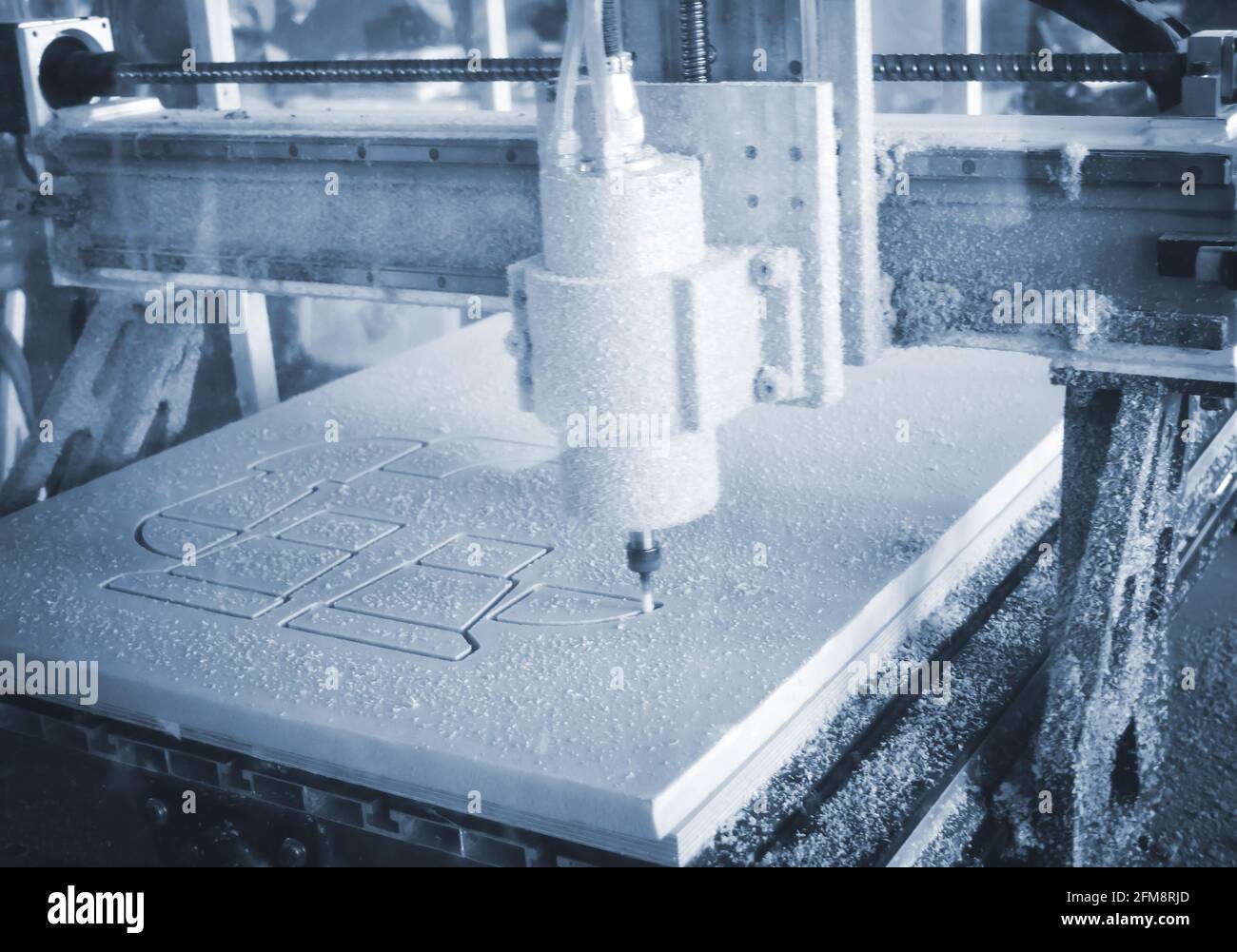 Milling machine cut out from white material pattern Stock Photo Alamy