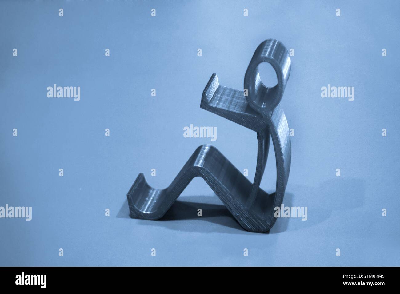 Abstract isolated object of a green color printed on a 3d printer on ...