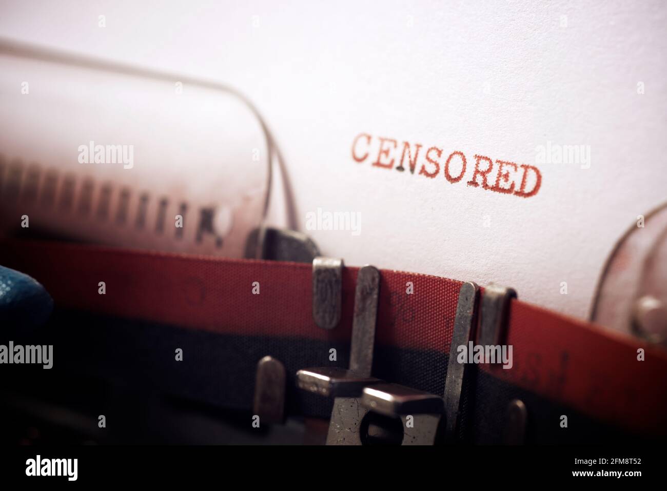 Censored word written with a typewriter Stock Photo - Alamy