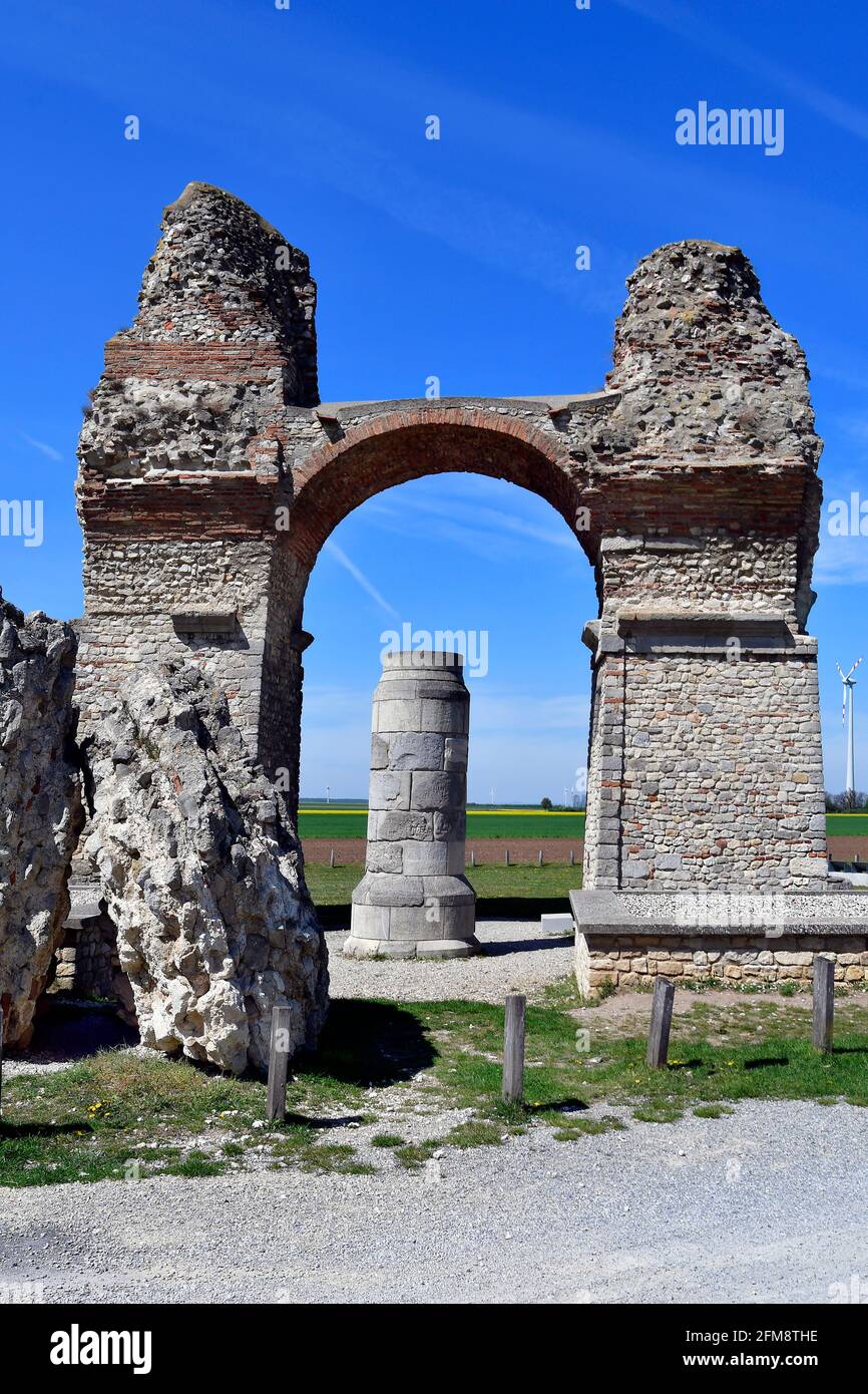 Austria, the Heidentor aka Heathens Gate is the ruin of a Roman triumphal arch in the former legionary fortress Carnuntum, now located in the village Stock Photo