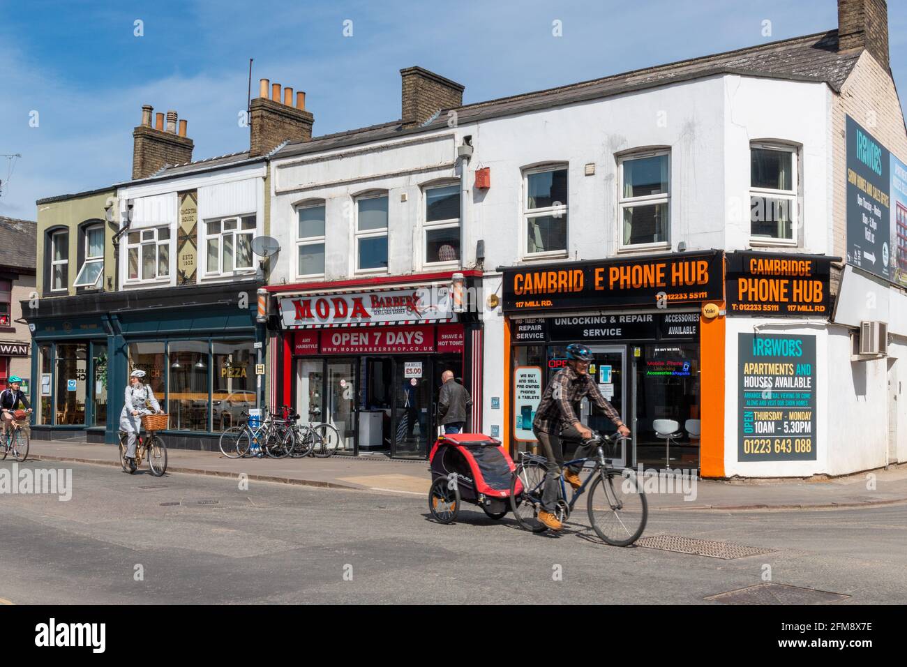 A row of shops on Mill Road, Cambridge, UK Stock Photo