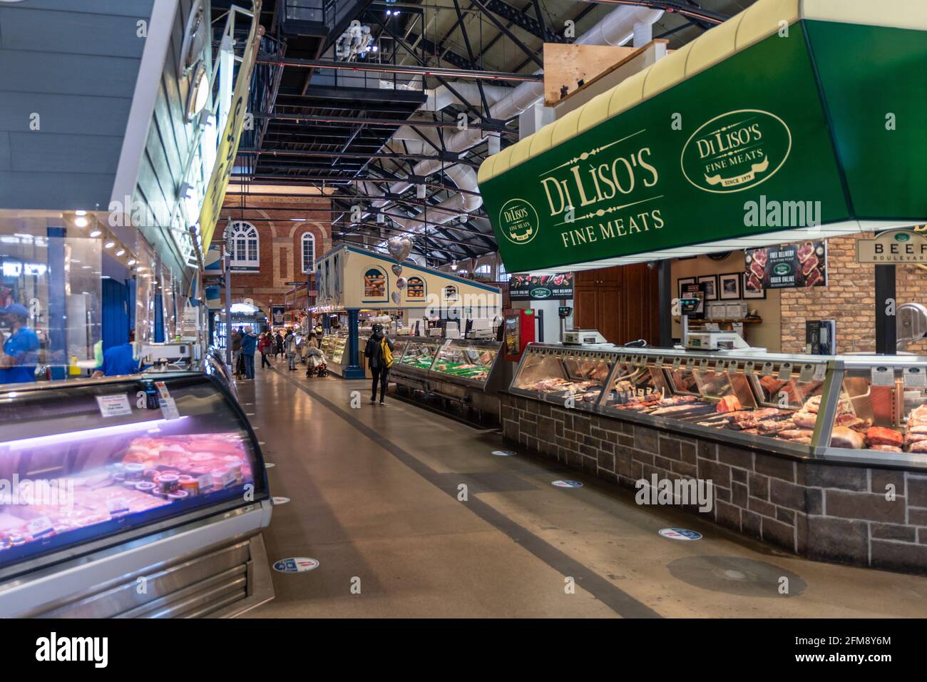 Saint Lawrence Market in Toronto, Canada. The famous place is considered one of the best food markets in the world. A corridor surrounded by businesse Stock Photo