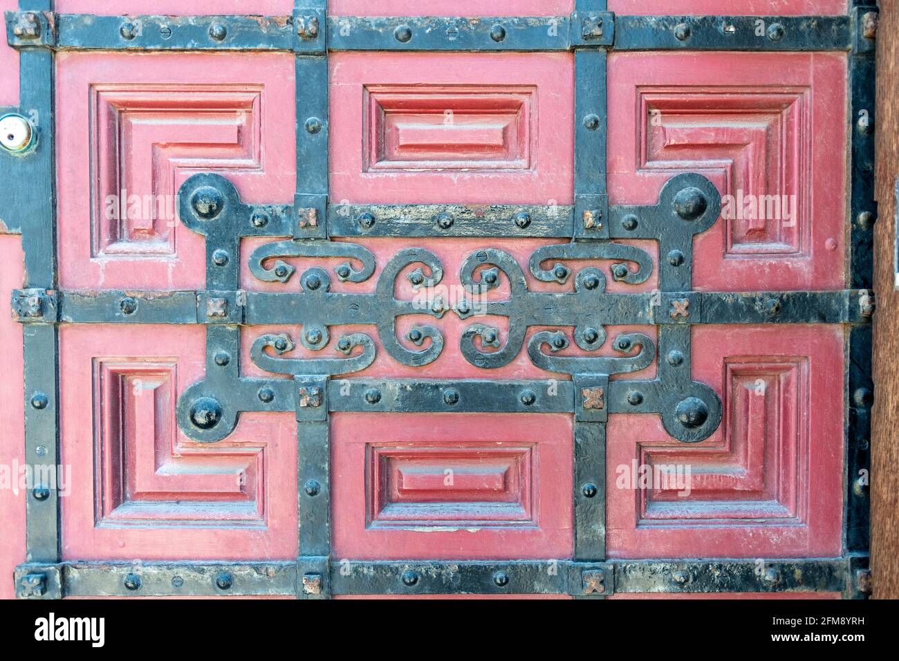 Colonial wooden door with metallic decoration in the Hockey Hall of Frame in the Toronto downtown, Canada Stock Photo