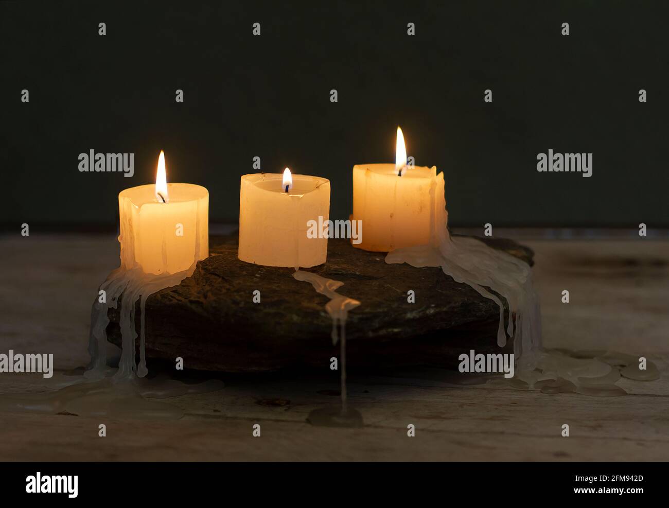 candles burning in the dark Stock Photo Alamy
