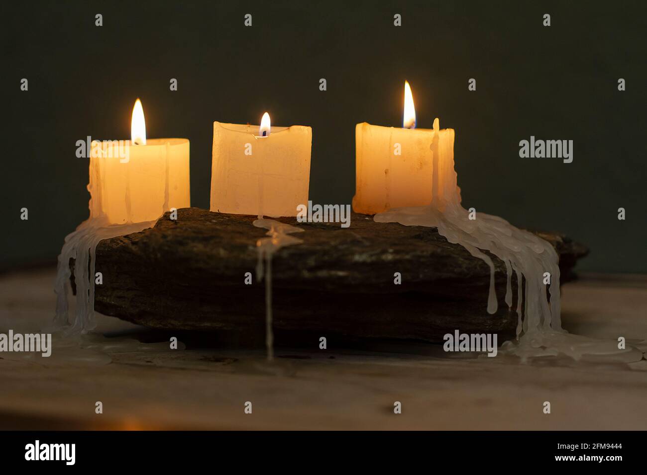 candles burning in the dark Stock Photo Alamy