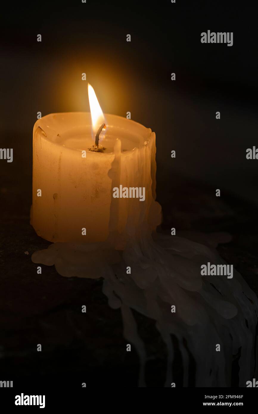 candle burning in the dark Stock Photo Alamy