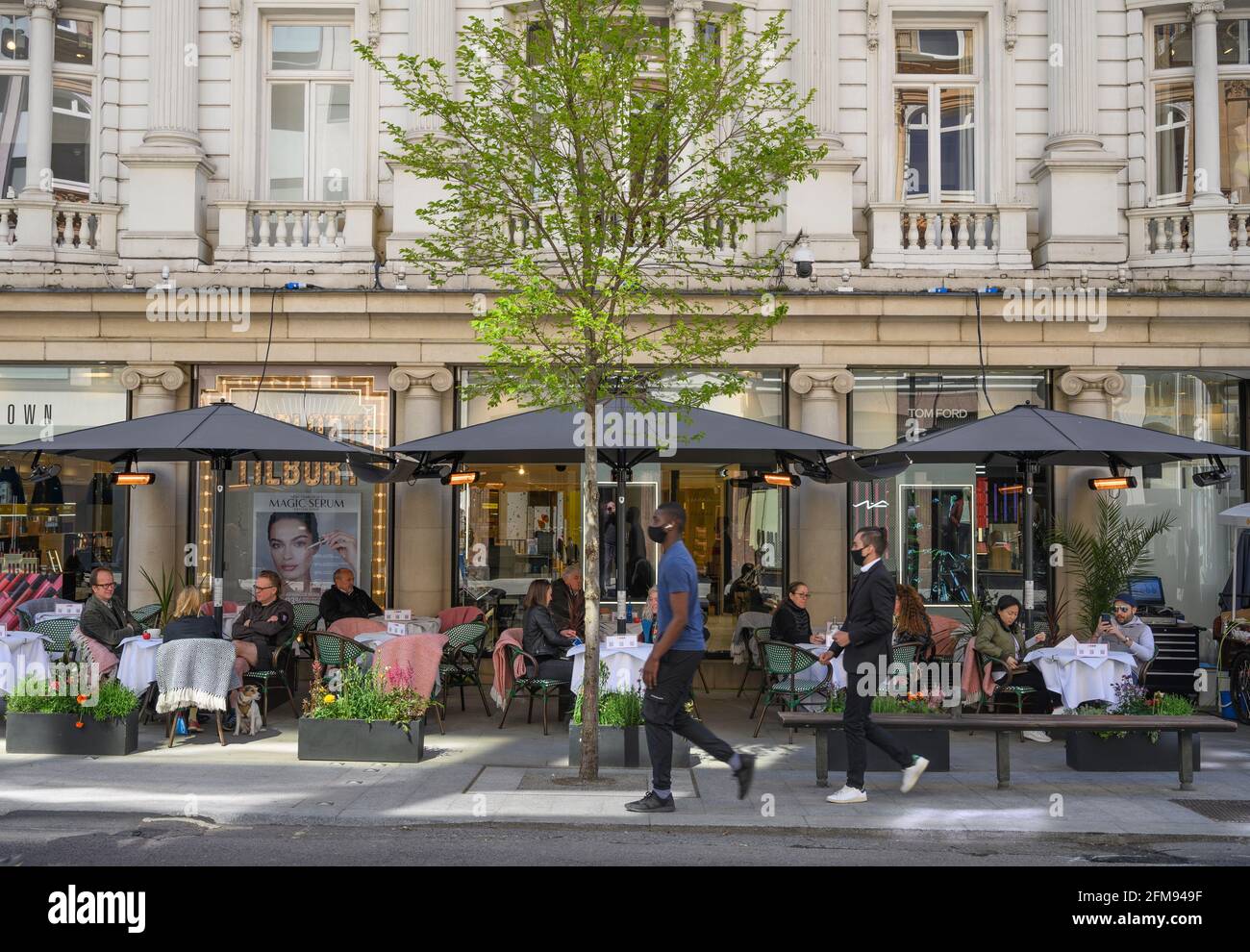 Mayfair London UK. 7 May 2021. Luxury shoppers take to the shops