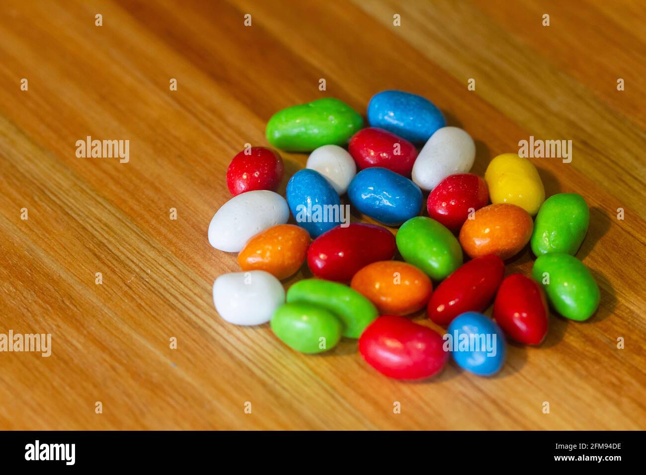 colorful chocolate candies on a table Stock Photo - Alamy