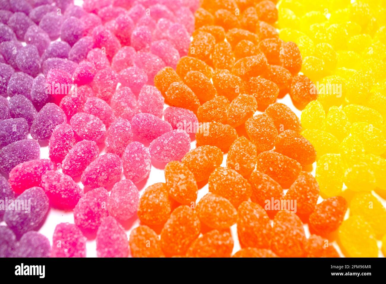 purple pink orange and yellow sugar sprinkled covered yellow fruit
