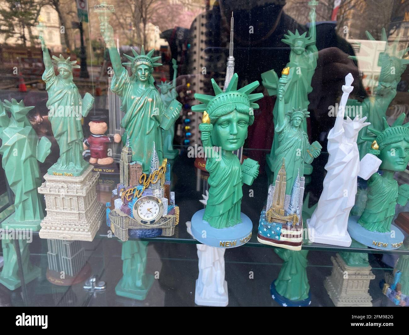 Statue of Liberty and other souvenirs in the window of an NYC gift shop
