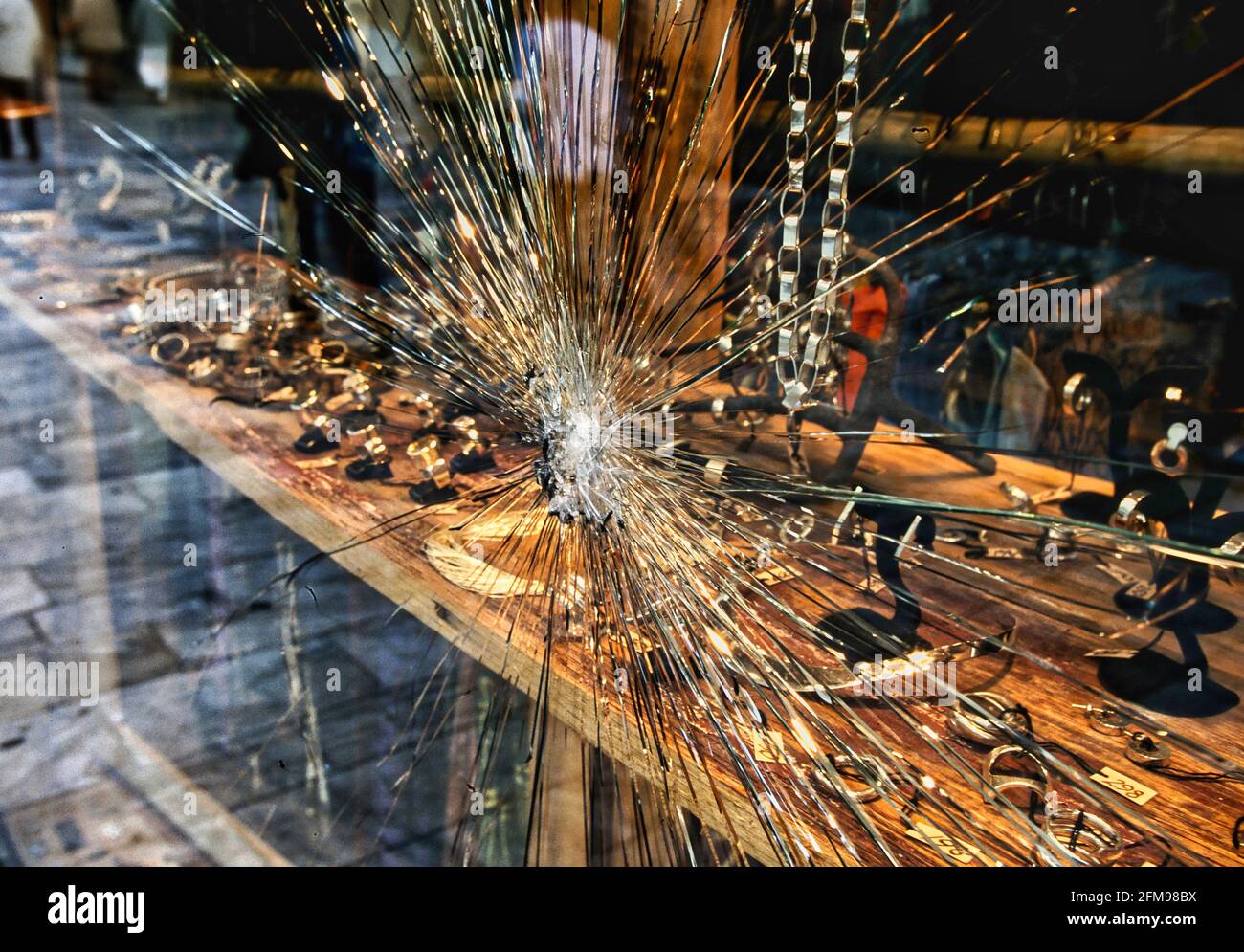 Failed robbery - a graphic view of a smashed jewellers window in St. Marks Square, Venice Stock Photo