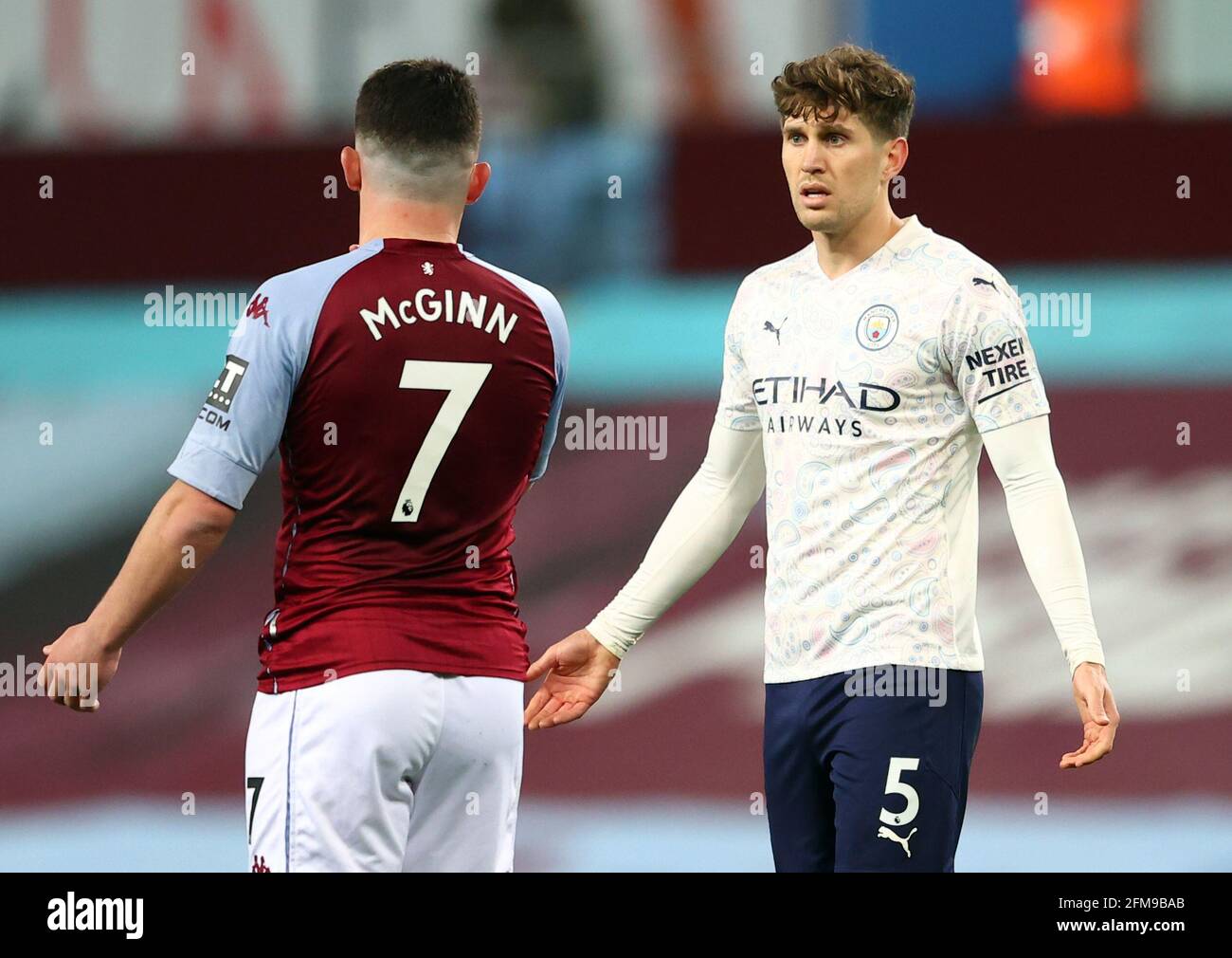 File photo dated 21-04-2021 of Manchester City's John Stones (right) before being sent off during the Premier League match at Villa Park, Birmingham. Issue date: Friday May 7, 2021. Stock Photo