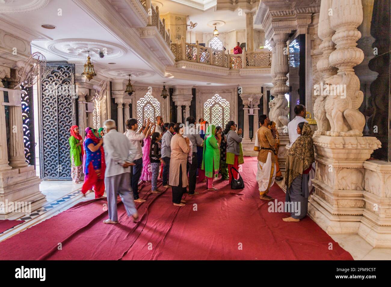 VRINDAVAN, INDIA - FEBRUARY 18, 2017: People in Krishna Balaram Mandir temple (Temple of ISKCON organisation) in Vrindavan, Uttar Pradesh state, India Stock Photo