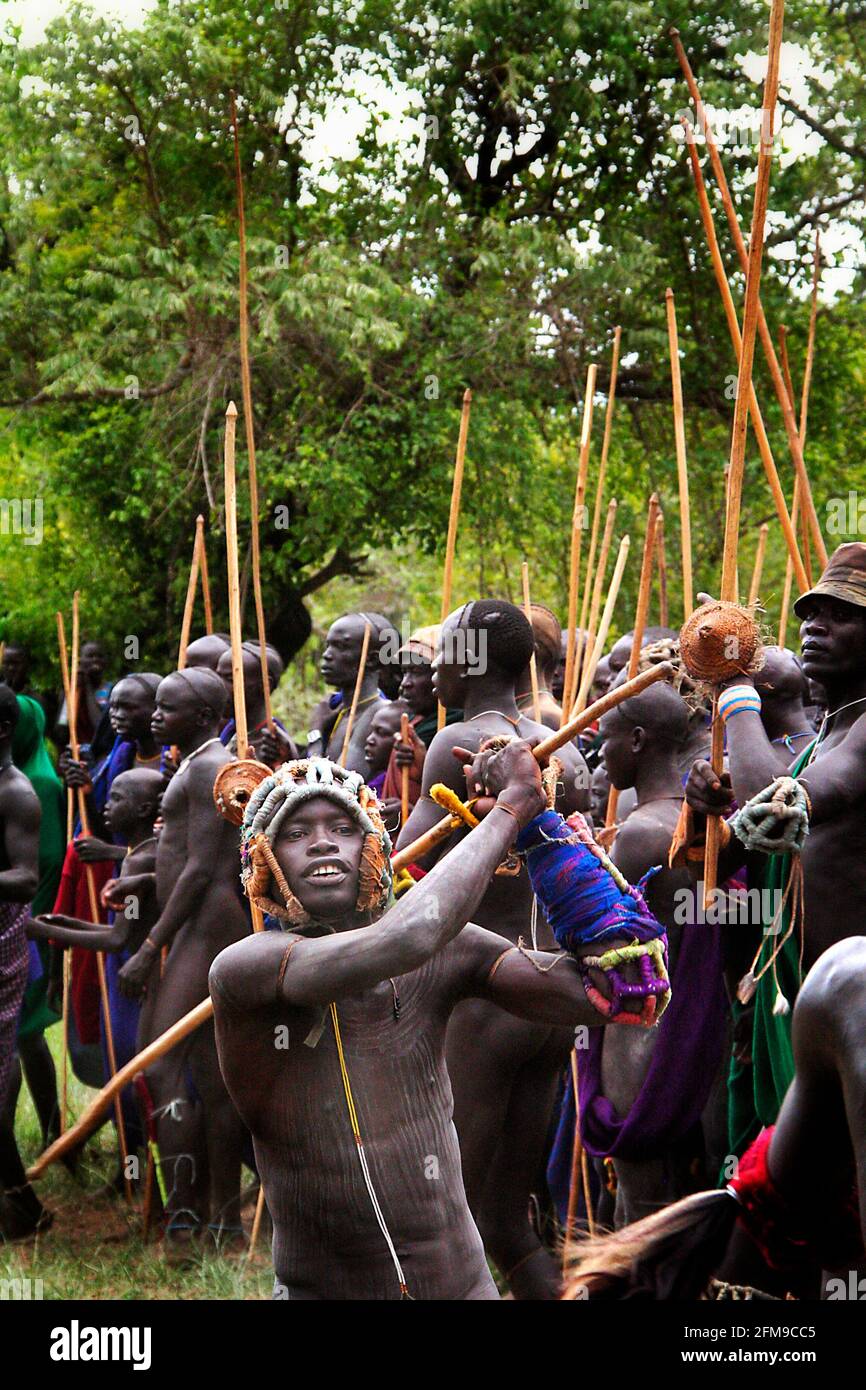 Stick fighting was banned in Ethiopia in 1994 but it has continued regardless. OMO VALLEY, ETHIOPIA: MEET THE tribe who engage in a violent and bloody Stock Photo