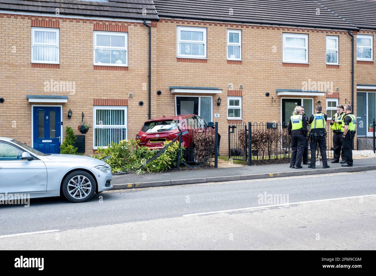 Car crash in front garden of house, Brownhills, UK Stock Photo Alamy